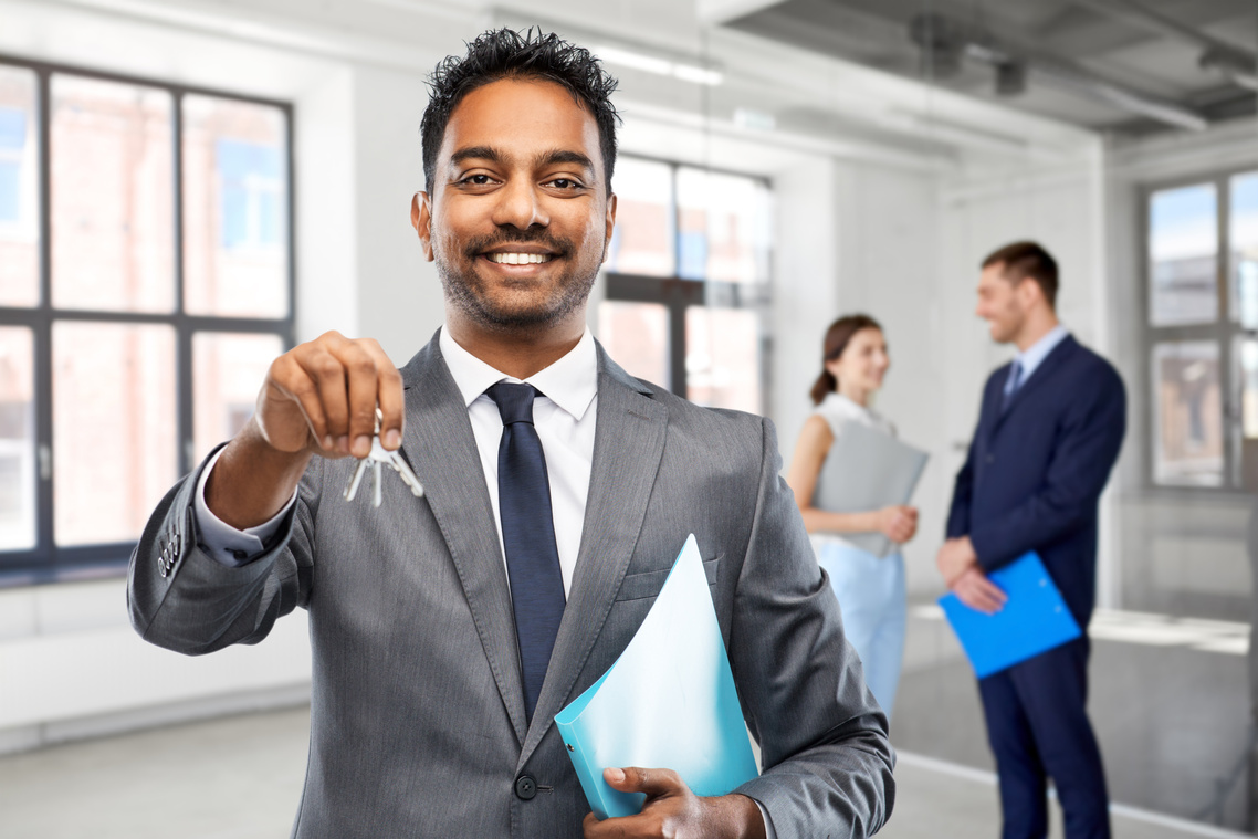 Realtor Holding House Keys  
